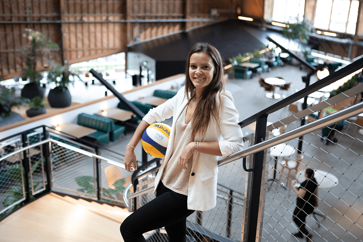 A photo of Celine with her arms crossed